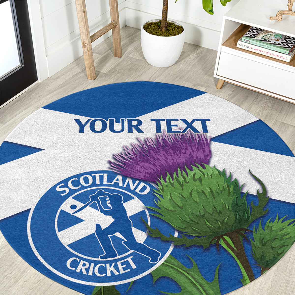 Round blue-and-white Scotland cricket rug with thistle graphic and circular badge