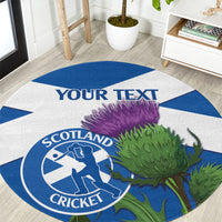 Round blue-and-white Scotland cricket rug with thistle graphic and circular badge