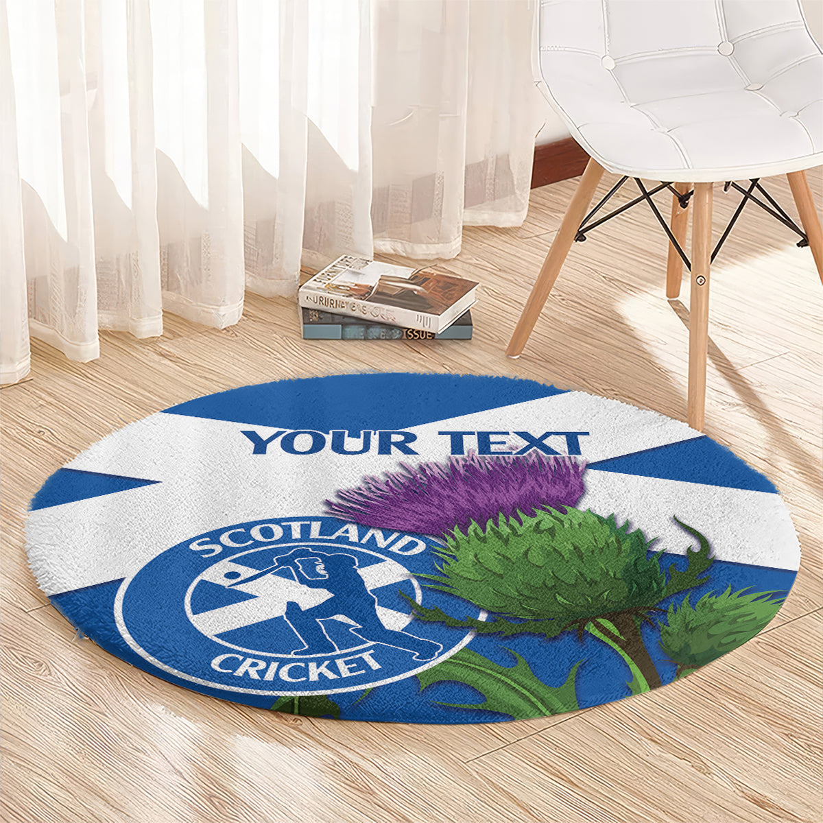 Round blue-and-white Scotland cricket rug with thistle graphic and custom text strip