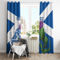 Blue and white curtains with Scotland Cricket logo and thistle artwork in living room