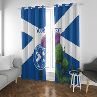 Blue and white curtains with Scotland Cricket emblem and thistle design in a living room