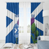Blue and white curtains with Scotland Cricket emblem and thistle design, two panels
