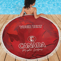 Red round beach blanket with white fringe showing 'YOUR TEXT' and Canada Cricket print