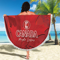 Red round beach blanket with white fringe, Canada Cricket logo and Maple Leafers text