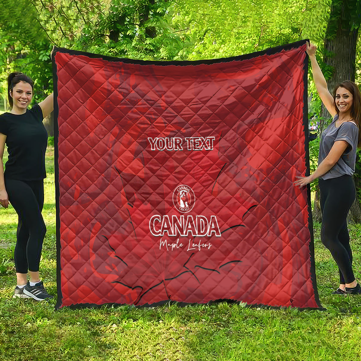 Red quilt blanket with custom text and Canada logo, diamond quilting, hanging display