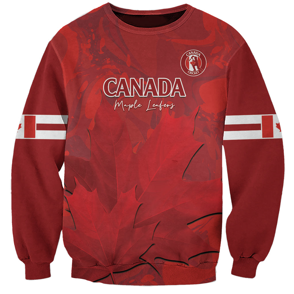 Red unisex crewneck sweatshirt with Canada logo, maple leaf graphic, white sleeve stripes