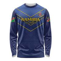 Blue long sleeve cricket shirt with Namibia Go Eagles front graphic and crests