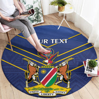 Blue round cricket rug with Namibia emblem, lions and flag shield, “YOUR TEXT” banner.
