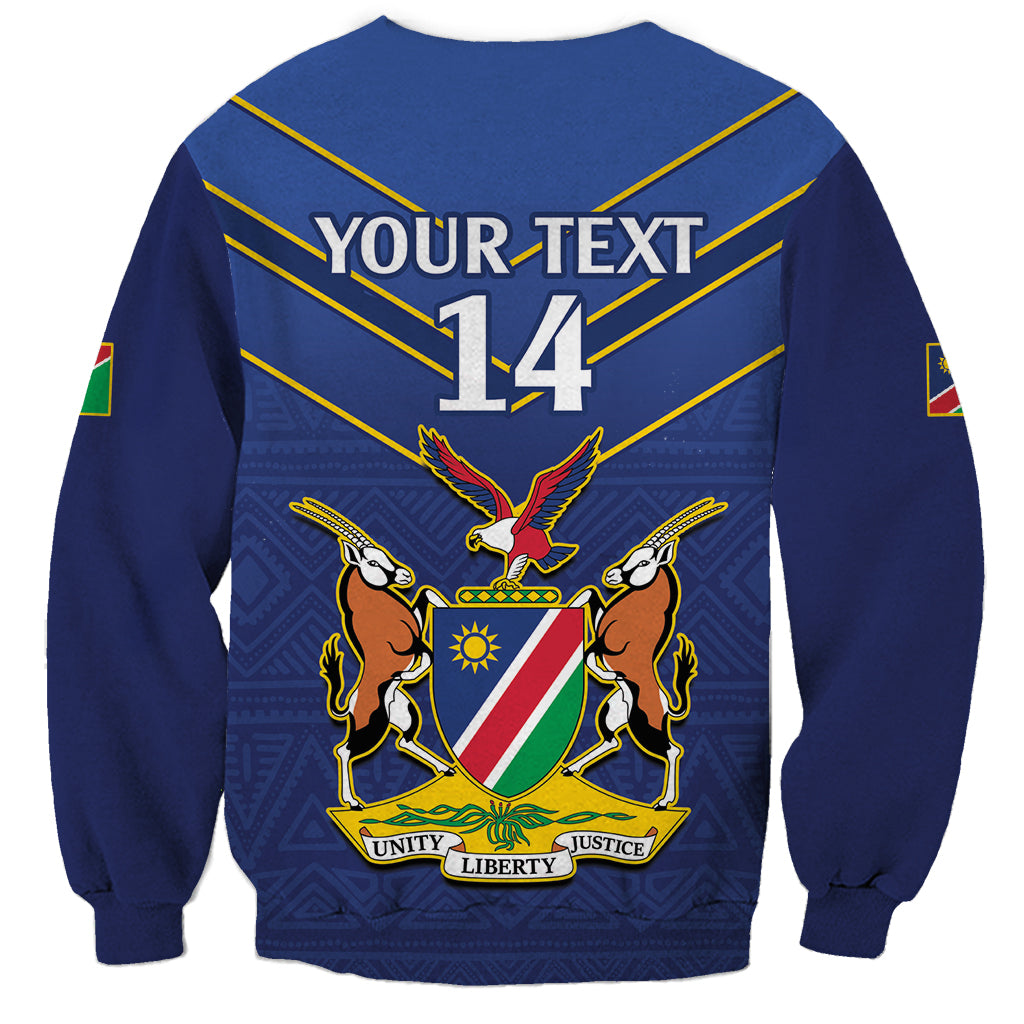 Blue crewneck cricket sweatshirt back with crest, wings and 'YOUR TEXT' 14