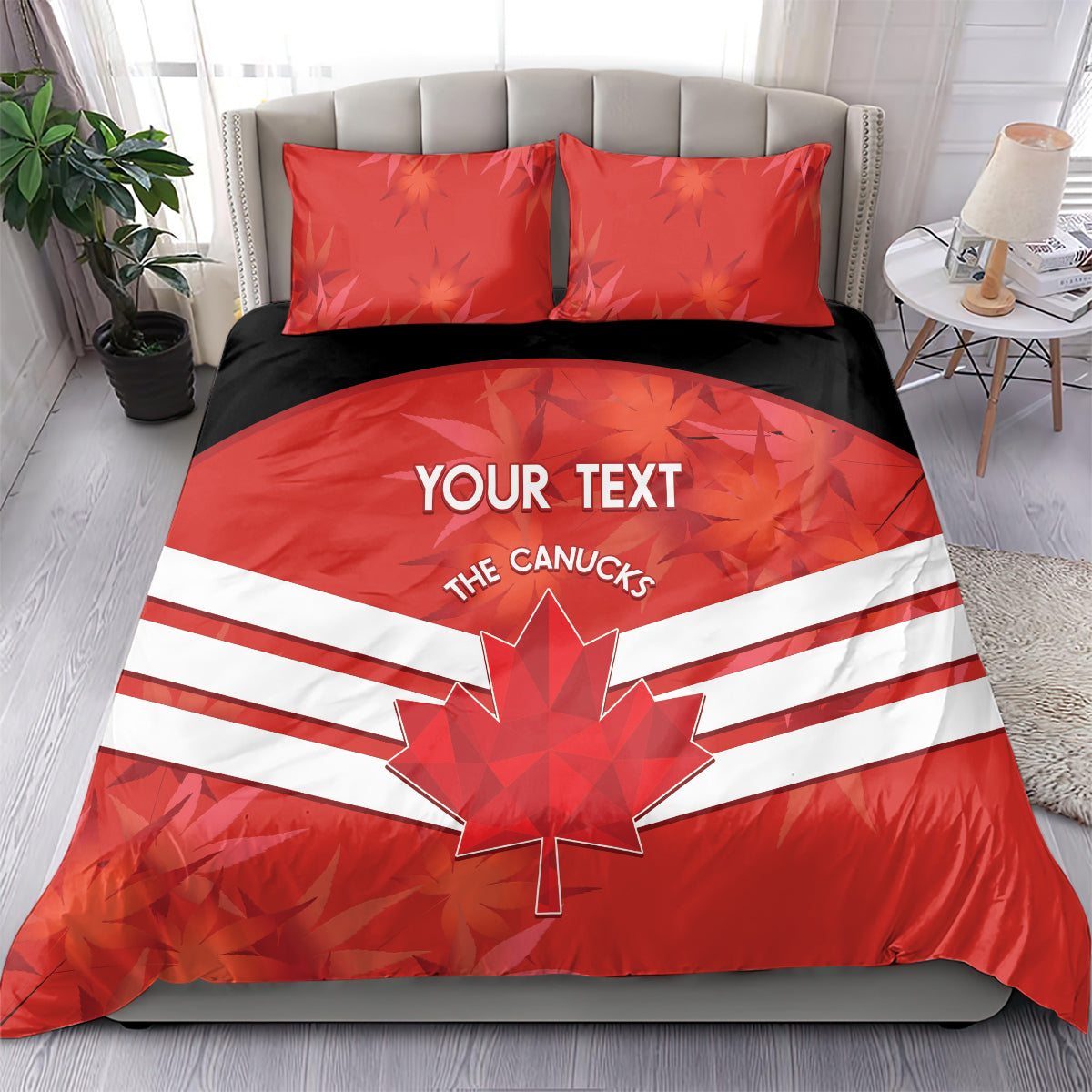 Red duvet bedding set with maple leaf emblem and white stripe band, two matching pillows
