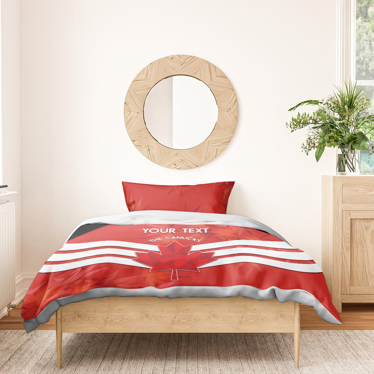 Red duvet bedding set with maple leaf graphic and white stripes, shown with one pillow