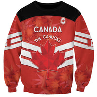 Unisex red and black Canada soccer sweatshirt with Canada wordmark and maple leaf