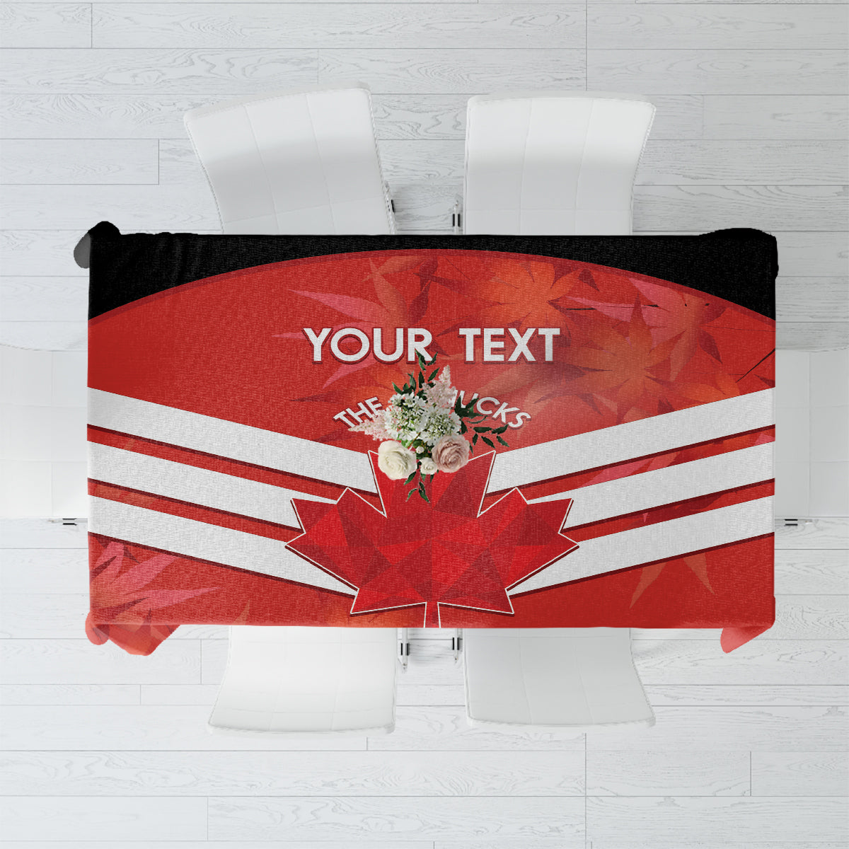 Red tablecloth with maple leaf and white stripes, custom text banner in center.