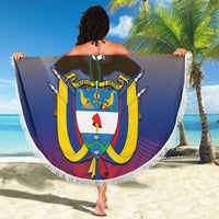 Round Colombia-themed beach blanket with yellow and blue crest graphic and white fringe