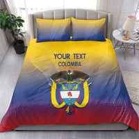 Colombia-themed duvet and two pillows, yellow-blue-red gradient with shield emblem