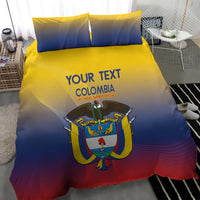 Blue, yellow, and red Colombia bedding set with crest artwork on the duvet and pillows