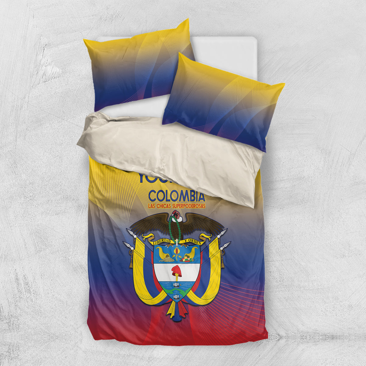 Flat-lay Colombia bedding set with duvet and two pillows in yellow, blue, and red