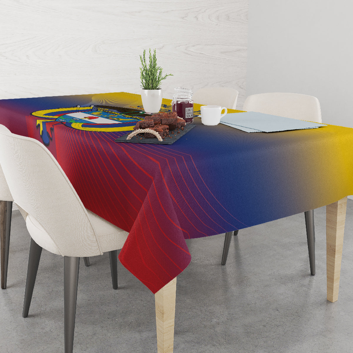 Football-themed tablecloth draped on dining table in red, blue and yellow