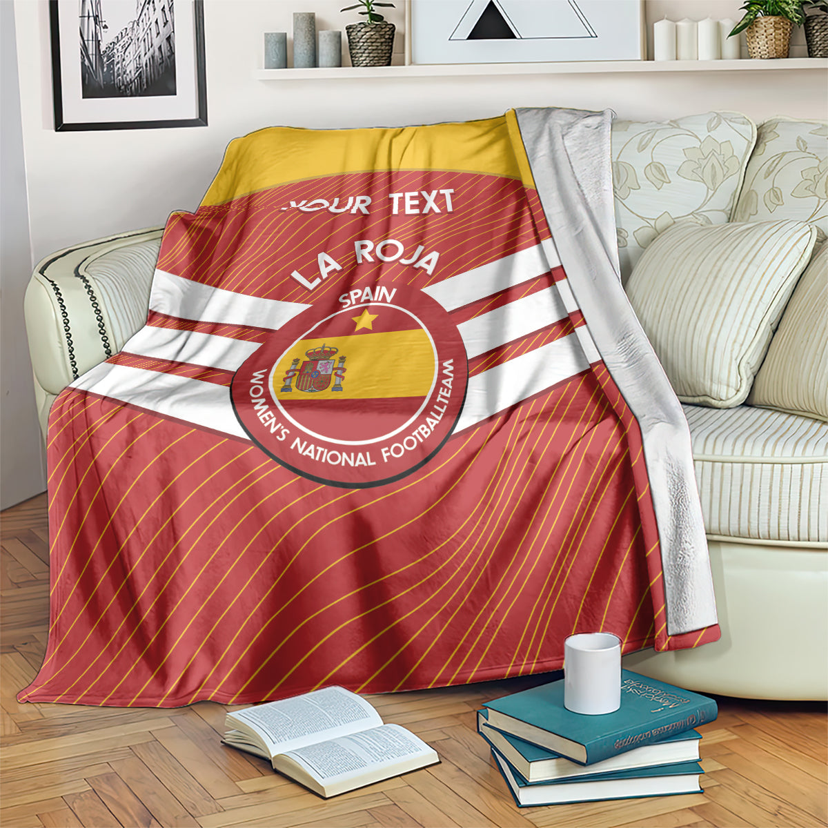 Spain football blanket in red with crest, white stripes, and 'YOUR TEXT' panel.