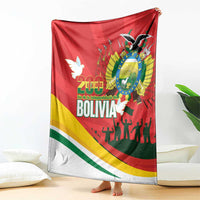Red Bolivia-themed blanket featuring 200 years text, flag stripes, dove, coat of arms, silhouettes