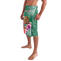 Green lava lava wrap skirt with eagle and flower art, geometric symbols