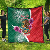 Mexico-themed quilt showing eagle, purple flowers, and white emblem on green/red.