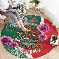 Round personalized carpet with eagle artwork, pink flowers, and red-green geometric border