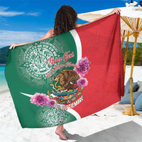 Green-and-red Mexico-style sarong with central emblem and 16 de Septiembre text