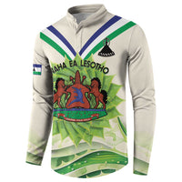 Ivory button-up sweatshirt with Lesotho stripes and central crest graphic