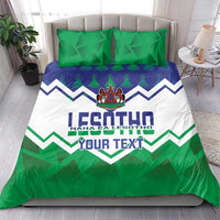 Personalized Lesotho bedding set with green pillowcases and crest zigzag duvet