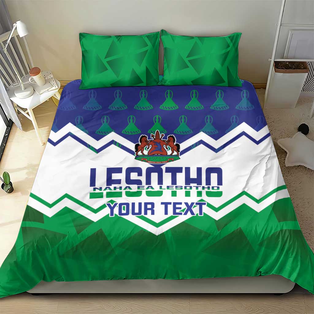 Personalized Lesotho bedding set with two green pillows and crest zigzag duvet