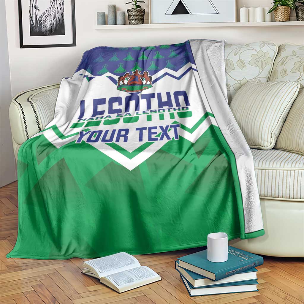 Personalised Lesotho Independence Day blanket on couch with green bottom panel and crest