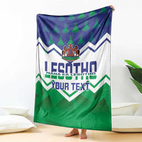 Personalised Lesotho Independence Day blanket hanging with blue patterned top and green base