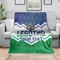 Personalised Lesotho Independence Day blanket draped over sofa with custom text
