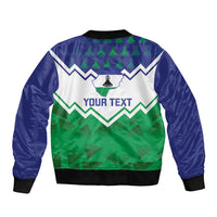Unisex bomber jacket back with ribbed hem and blue/green zigzag print, 'YOUR TEXT'