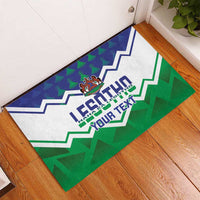 Green rubber doormat with zigzag design and crest, personalized text graphic
