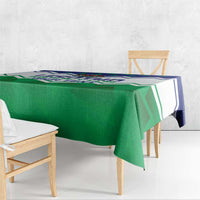 Green personalised tablecloth with independence-style blue pattern and border