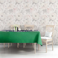 Green tablecloth with independence-themed zigzag print on long dining table