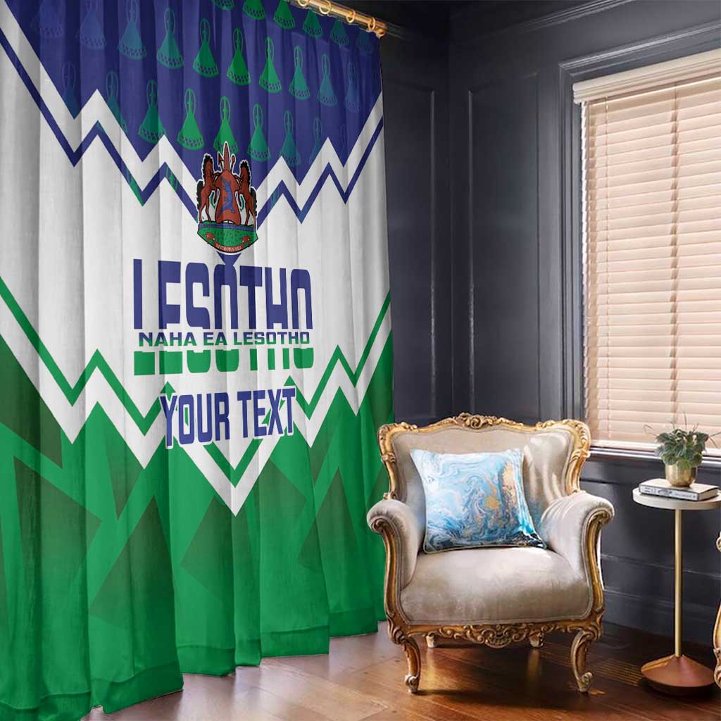 Lesotho-themed window curtain in blue and green with zigzags, crest logo, and 'YOUR TEXT'.