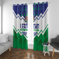Lesotho-themed window curtain with blue and green zigzag design, crest emblem, and 'YOUR TEXT'.