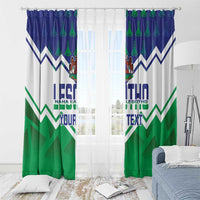 Lesotho-themed window curtain with blue header, green zigzag stripes, crest, and 'YOUR TEXT'.