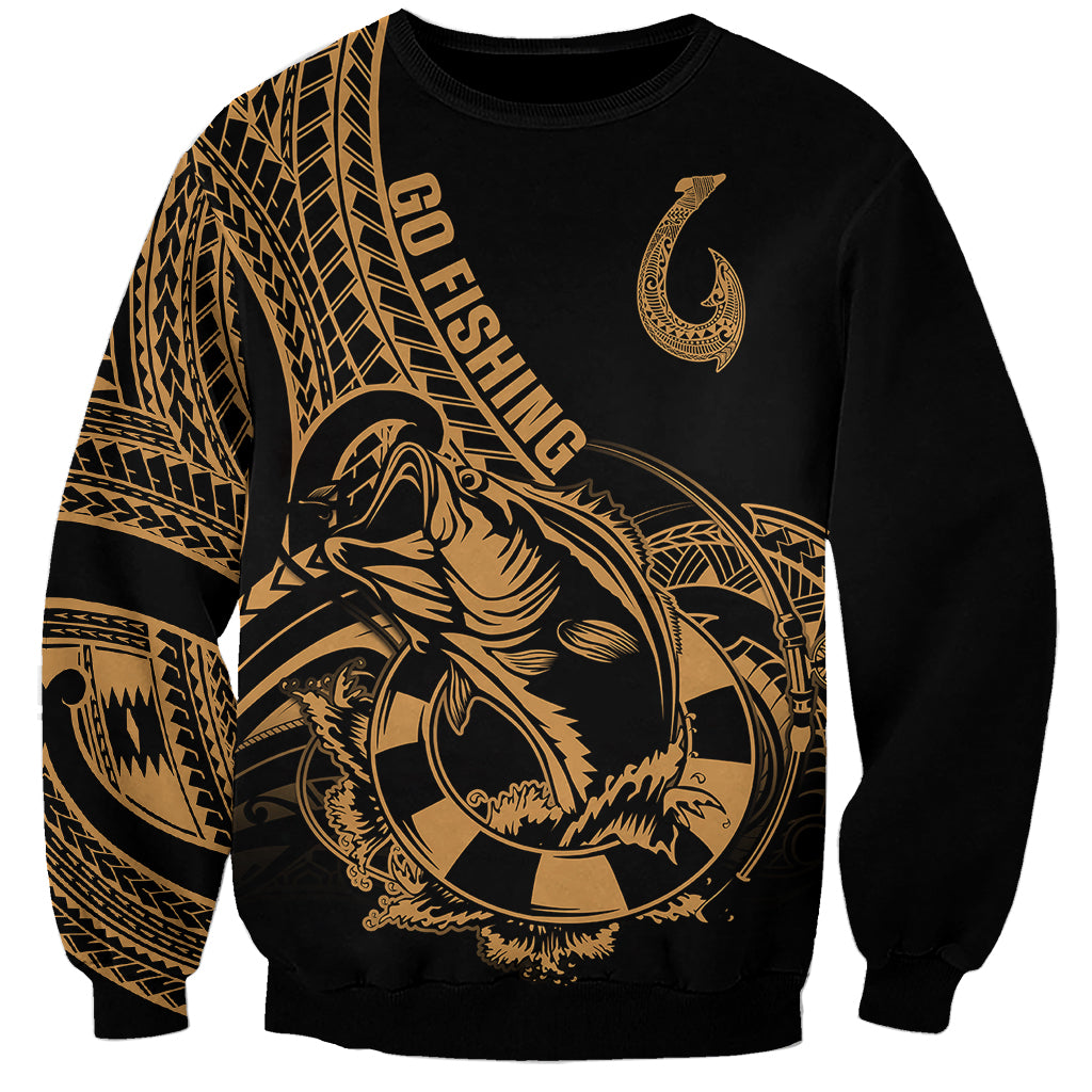Black sweatshirt with gold fishhook tattoo and Polynesian pattern on chest and sleeves