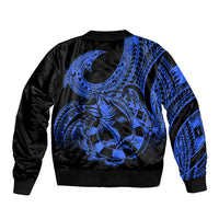 Blue and black bomber jacket with large tribal fish hook tattoo graphic, ribbed hem