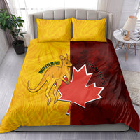 Yellow and red bedding set with kangaroo and Canada leaf print; matching twin pillows