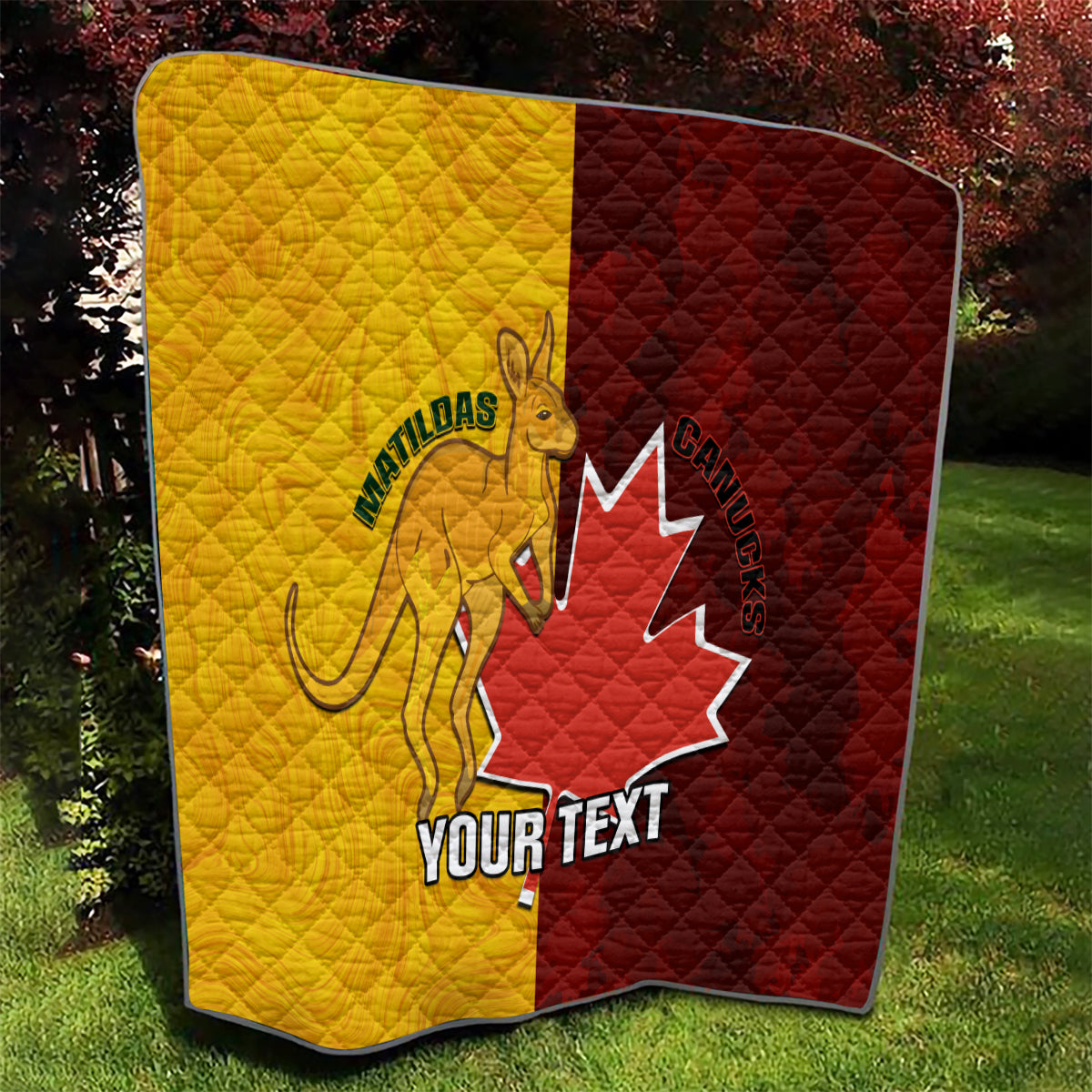 Gold and burgundy soccer quilt with Canada maple leaf and Matildas player graphic