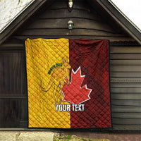 Gold and burgundy soccer quilt hanging on a porch with Canada maple leaf graphic