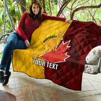 Gold and burgundy soccer quilt on a patio with Canada maple leaf and Matildas emblem