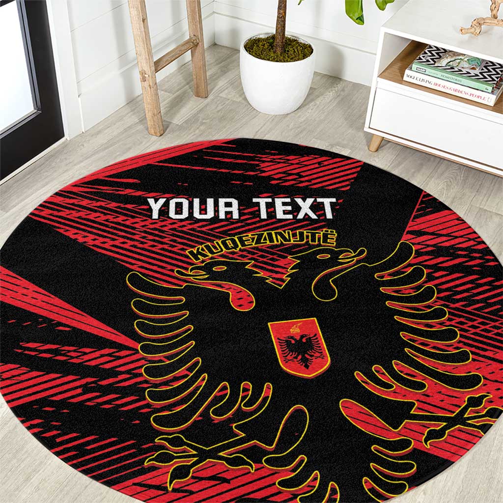 Custom round football rug, black base with red grunge stripes and gold crest motifs