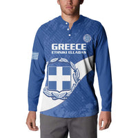 Blue football sweatshirt on model with button placket, Greece crest, and diagonal flag
