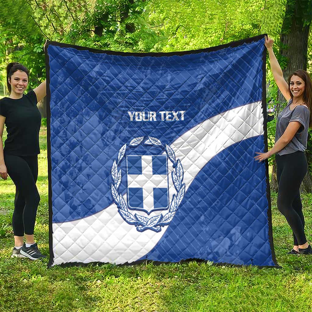 Blue quilt with Greece crest, 'YOUR TEXT' text, and white diagonal stripe design
